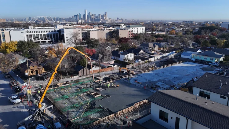 Bishop Modern reinforcement and formwork with the concrete pump boom above the placement area