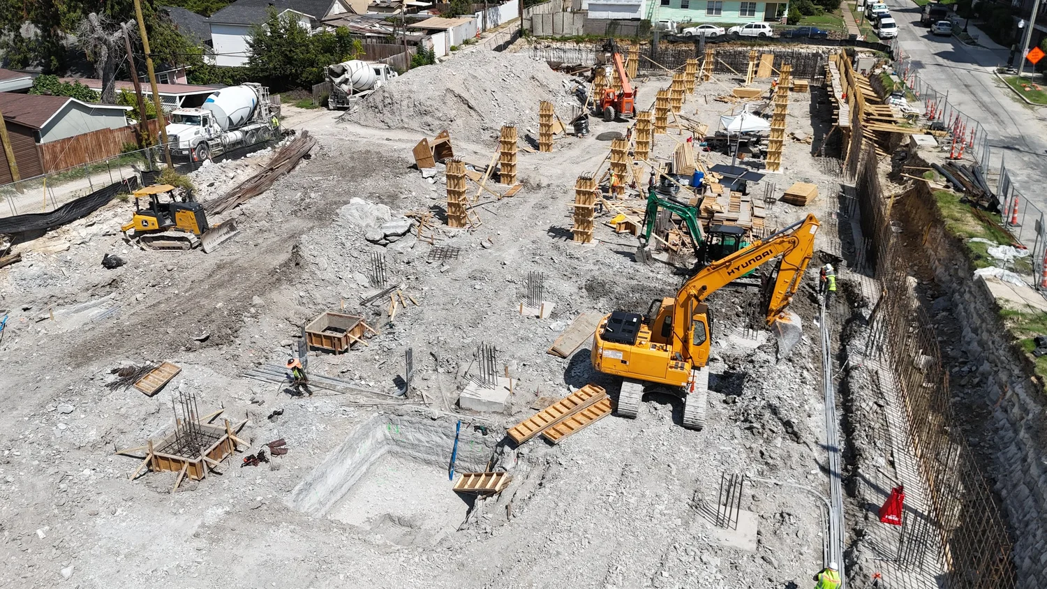Bishop Modern excavation, foundation forms, equipment, and materials viewed from above