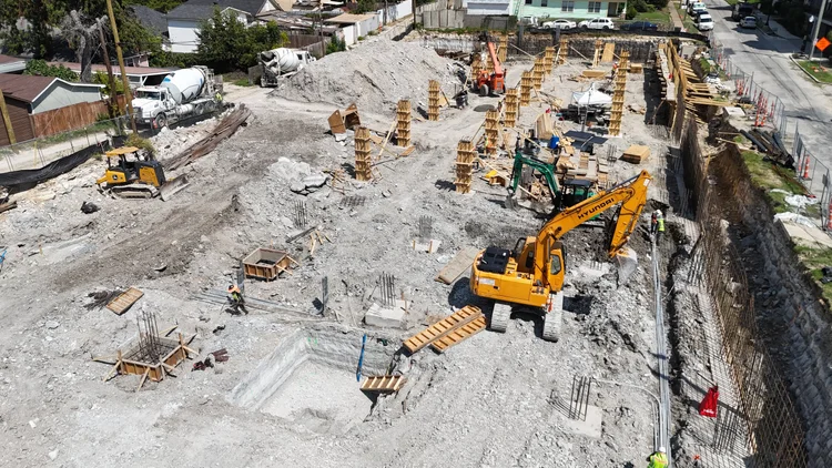 Bishop Modern excavation, foundation forms, equipment, and materials viewed from above