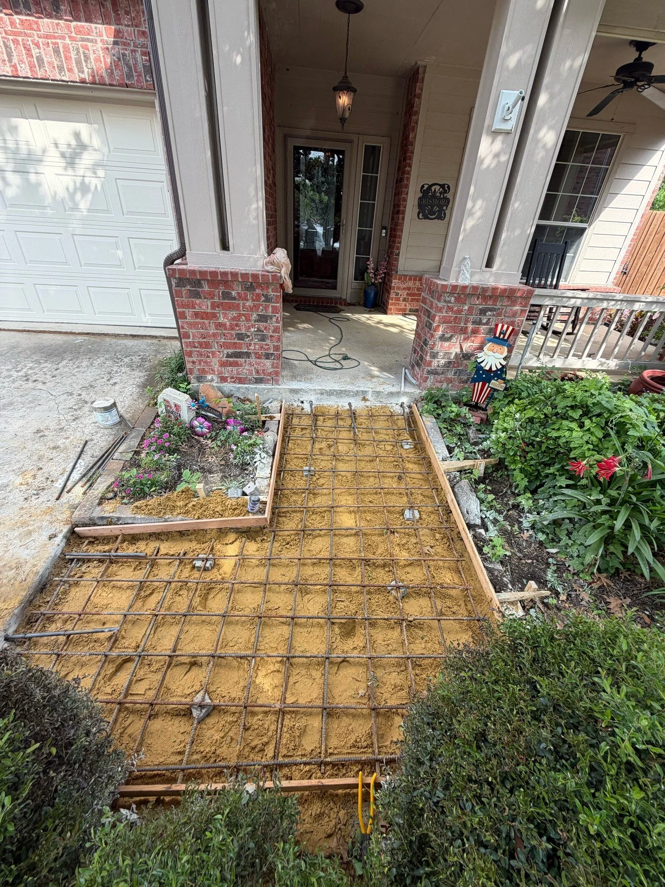 Reinforcing steel and forms laid out for a front entry walkway.