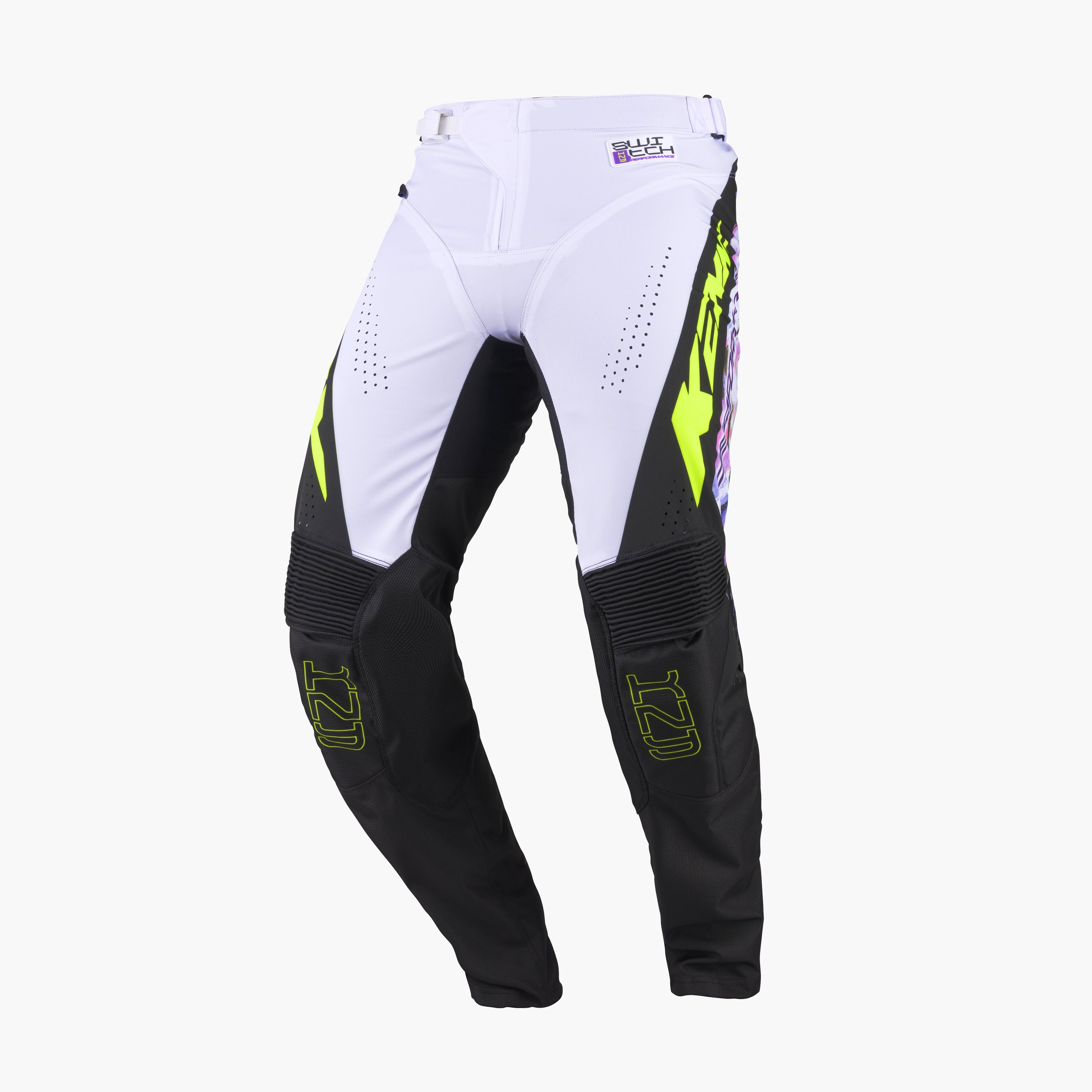Pantalon de motocross blanc avec des accents noirs et jaunes, logo 'TLD' sur la jambe, conçu pour la pratique du motocross ou du dirt bike.