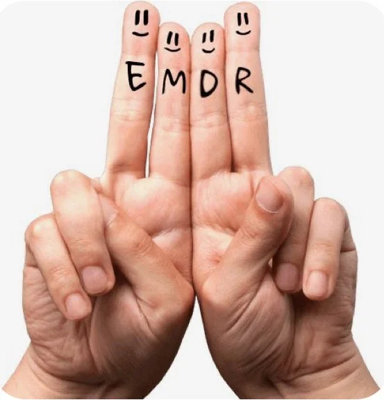 Two hands with fingers raised, each finger has a face drawn on the tip and a letter written below, spelling "EMDR."