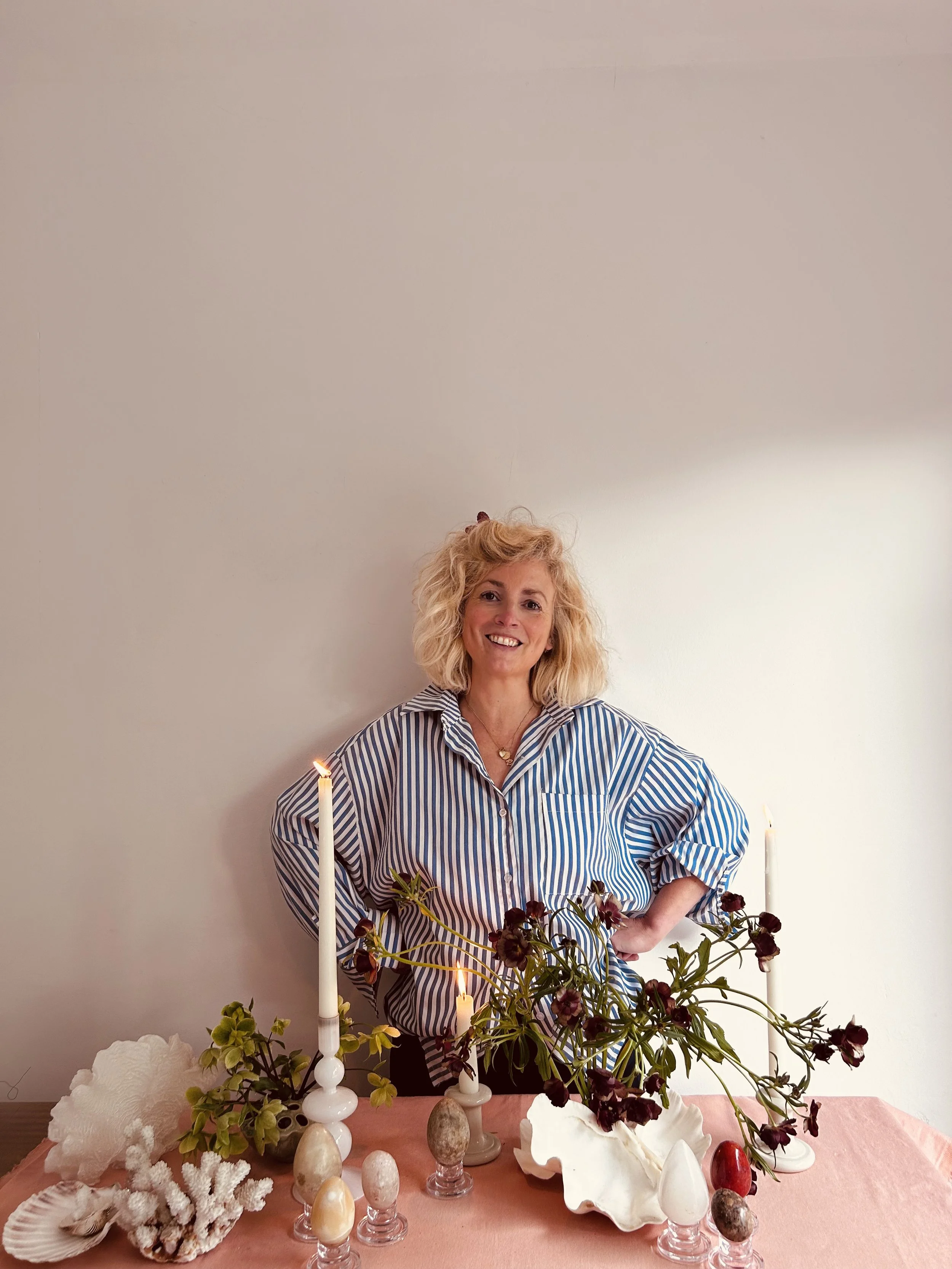 One of hte best florists in the cotswolds with hands on her hips