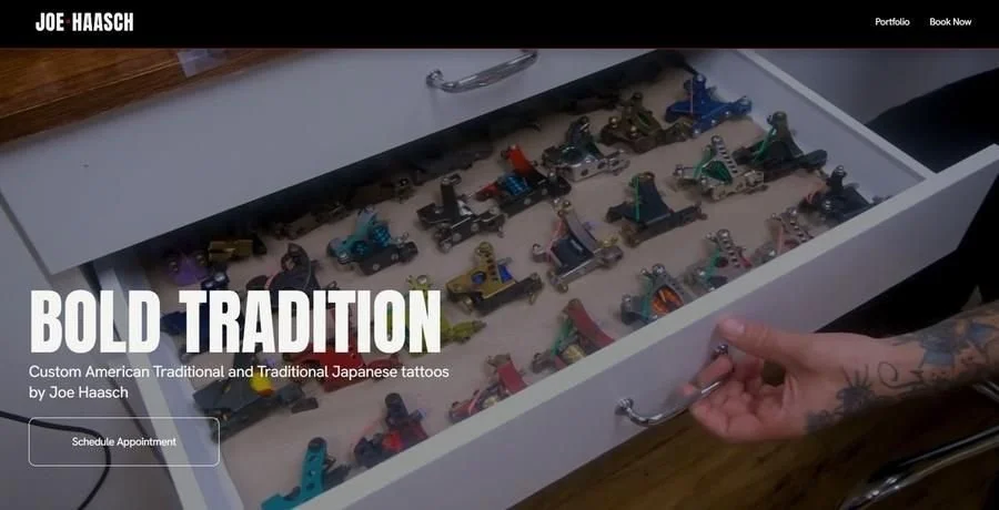 A drawer filled with tattoo machines and equipment, with a person's hand opening it, showing a tattoo artist's workspace.