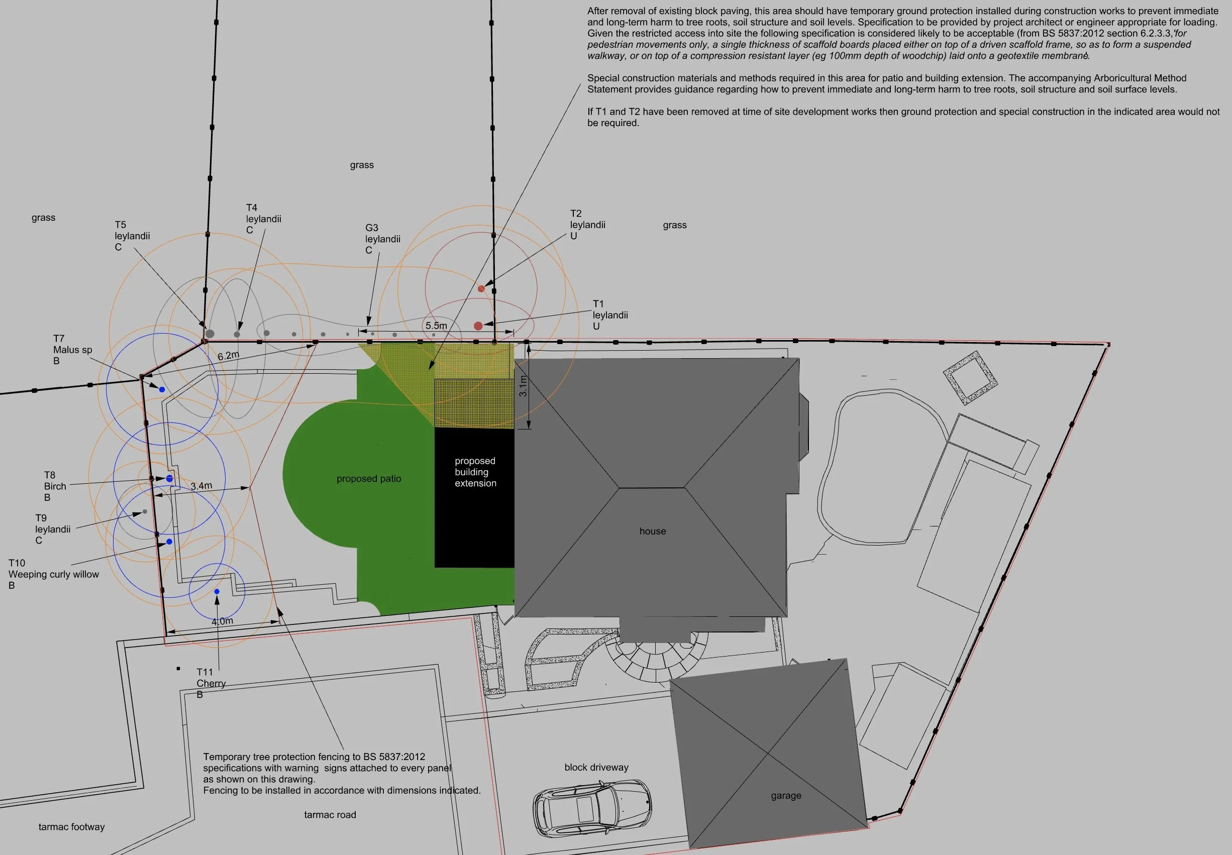 A detailed site plan showing landscaping, construction, and infrastructure elements including grass, proposed patio, house, garage, driveway, fencing, trees, and measurement annotations.