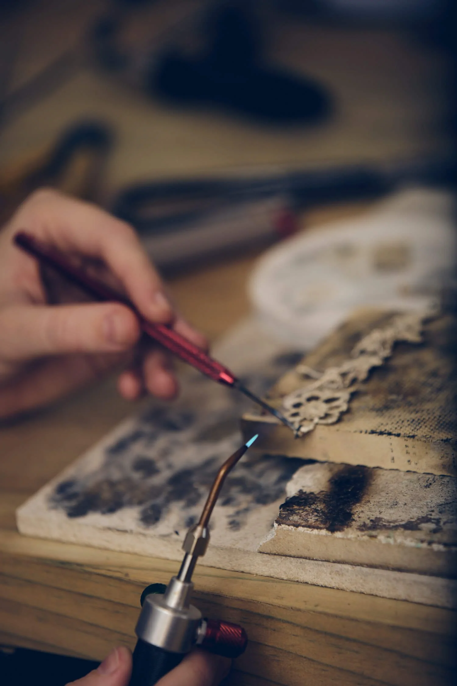 Jewellery-designers-hand-working-on-bracelet.jpg