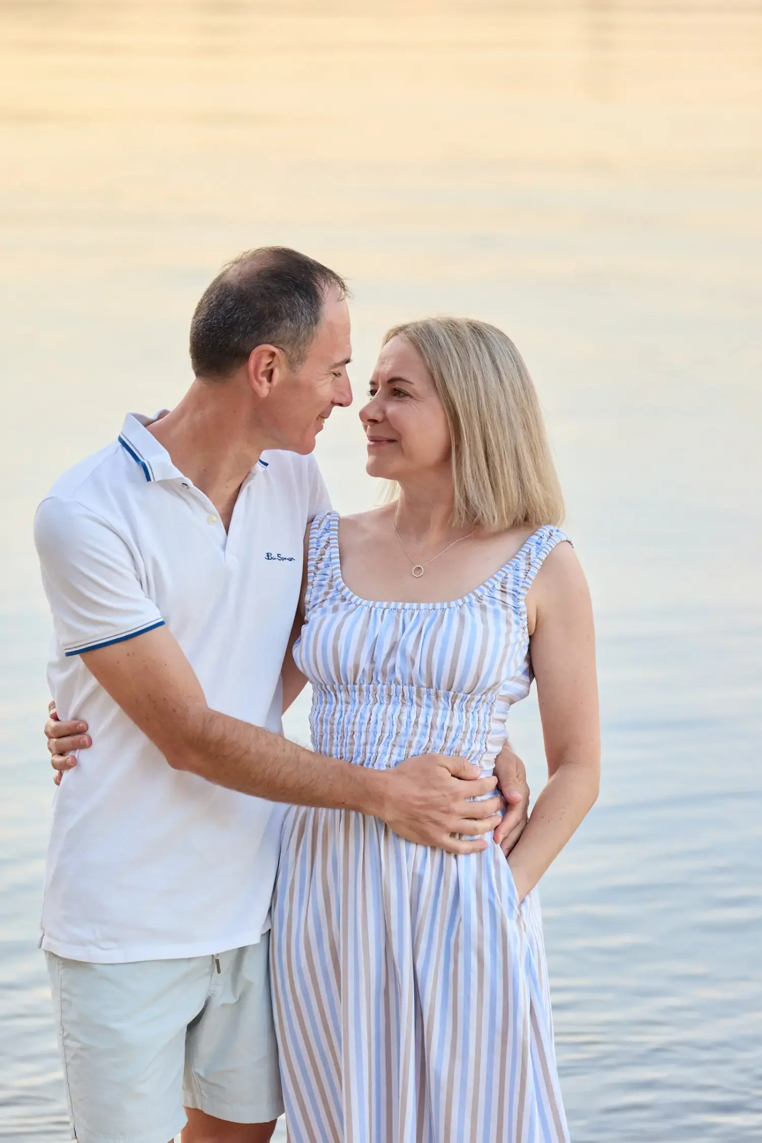 Couple-looking-at-each-other-at-Matilda-Bay.webp