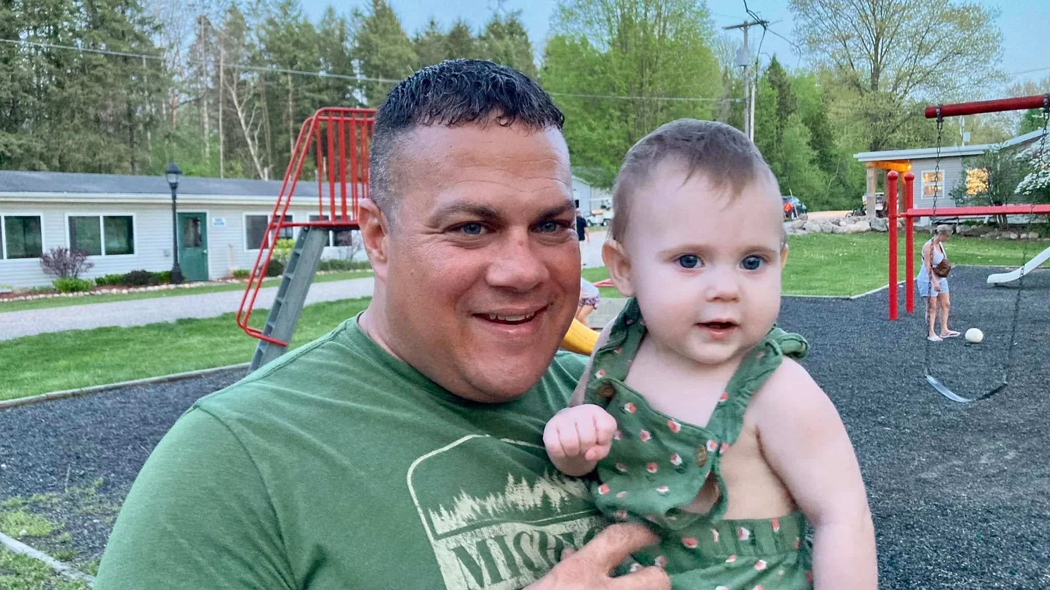 Bill Butler with a baby
