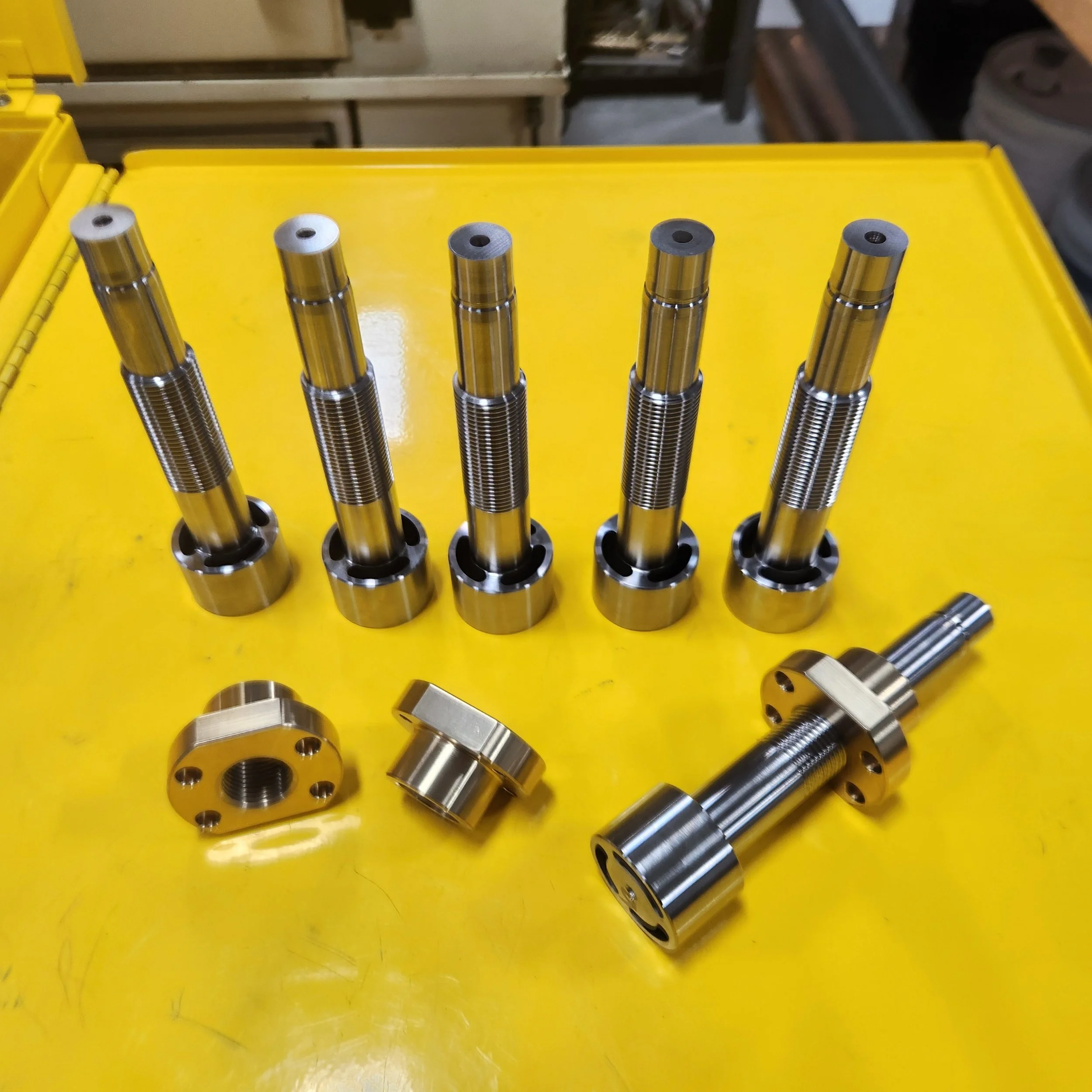 Threaded Cores and Drive Nuts ready for special molding threads to be ground.