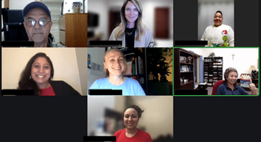 Screenshot of a virtual meeting with eight diverse participants, some smiling and in different indoor settings.