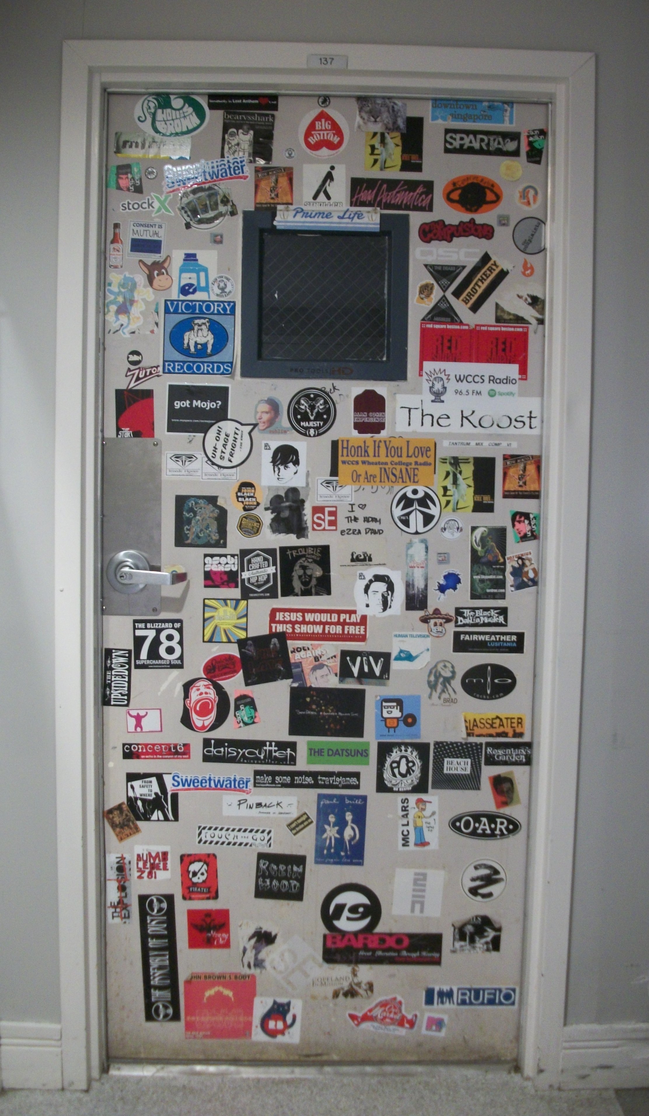 door covered in stickers