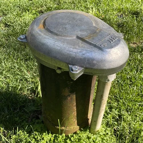 Water well pump head.