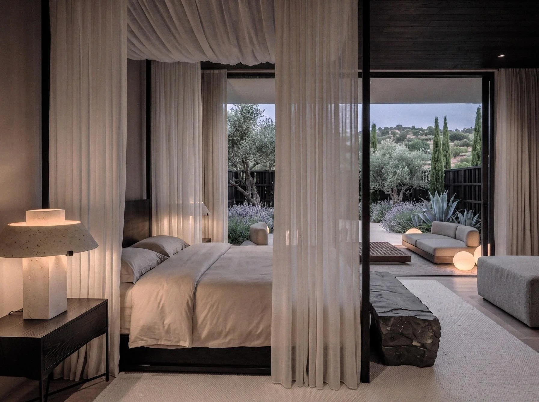 Bedroom with sheer linen drapes opening onto a Mediterranean garden, Studio Zaé