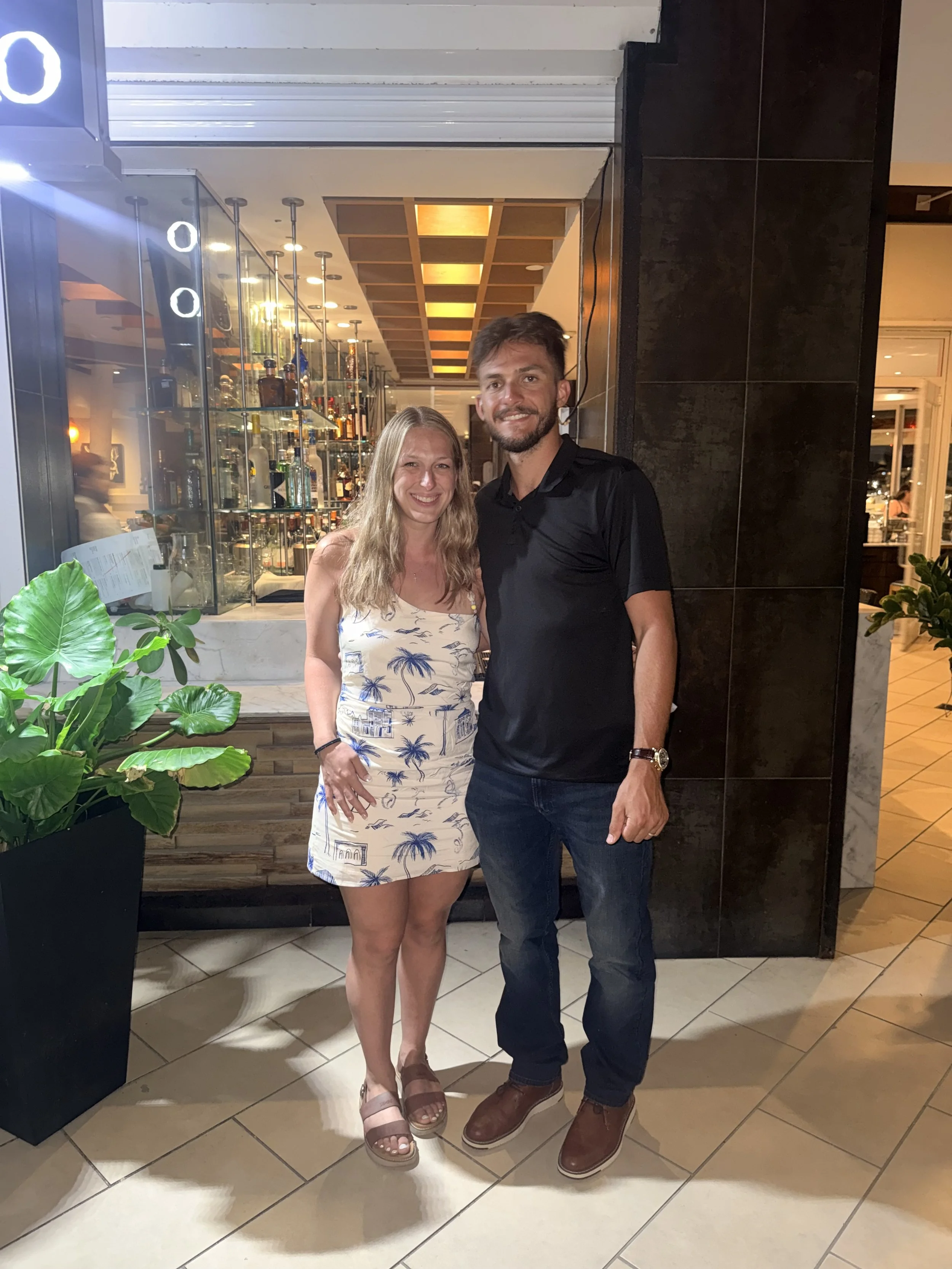 Small, family owned business owner with his wife.