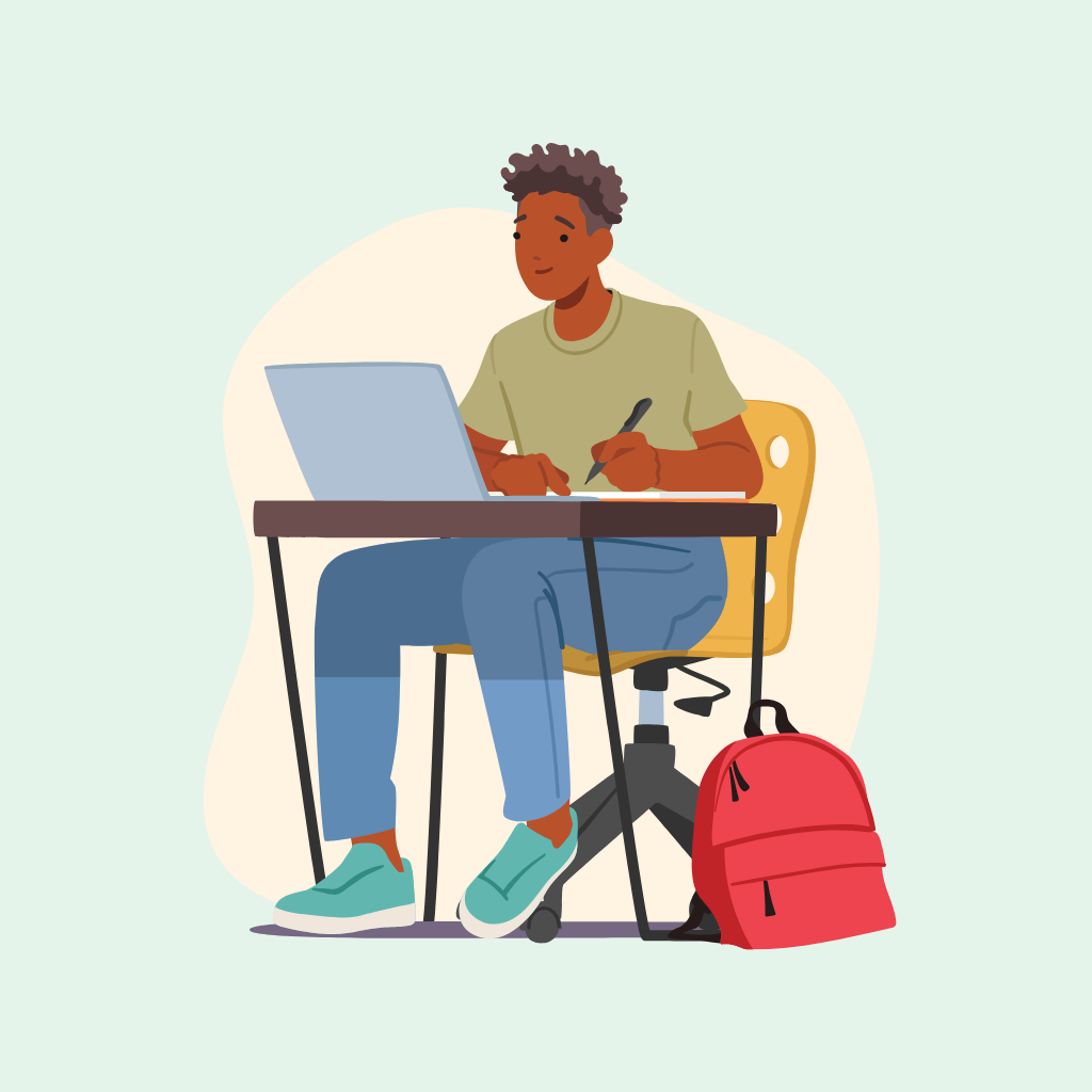 A person sitting at a desk with a laptop, writing with a pen, with a red backpack beside them.