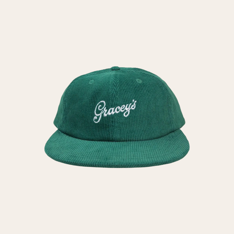 Green corduroy cap with embroidered Gracey’s script logo