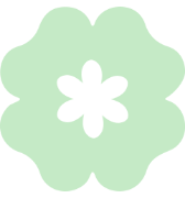 A stylized green flower or snowflake-like shape with a black central element