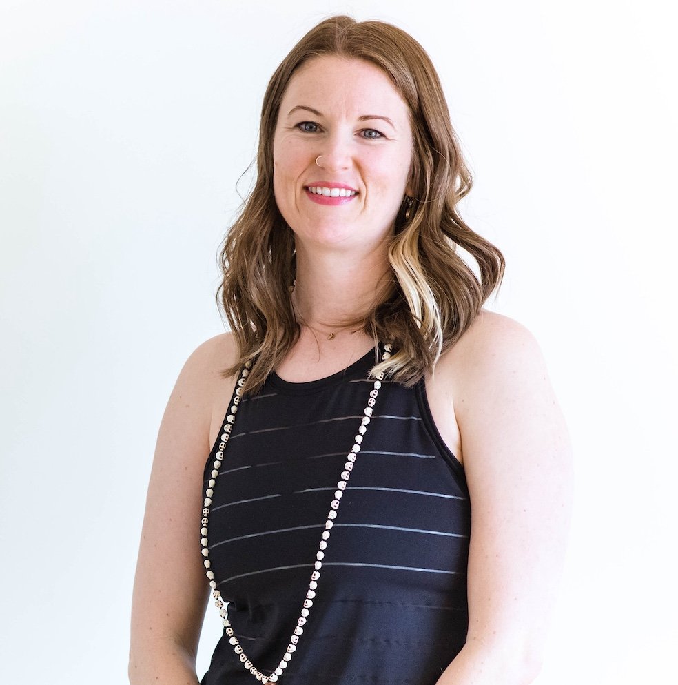 Jana, founder of Verve Works, smiling in a professional headshot against a white backdrop