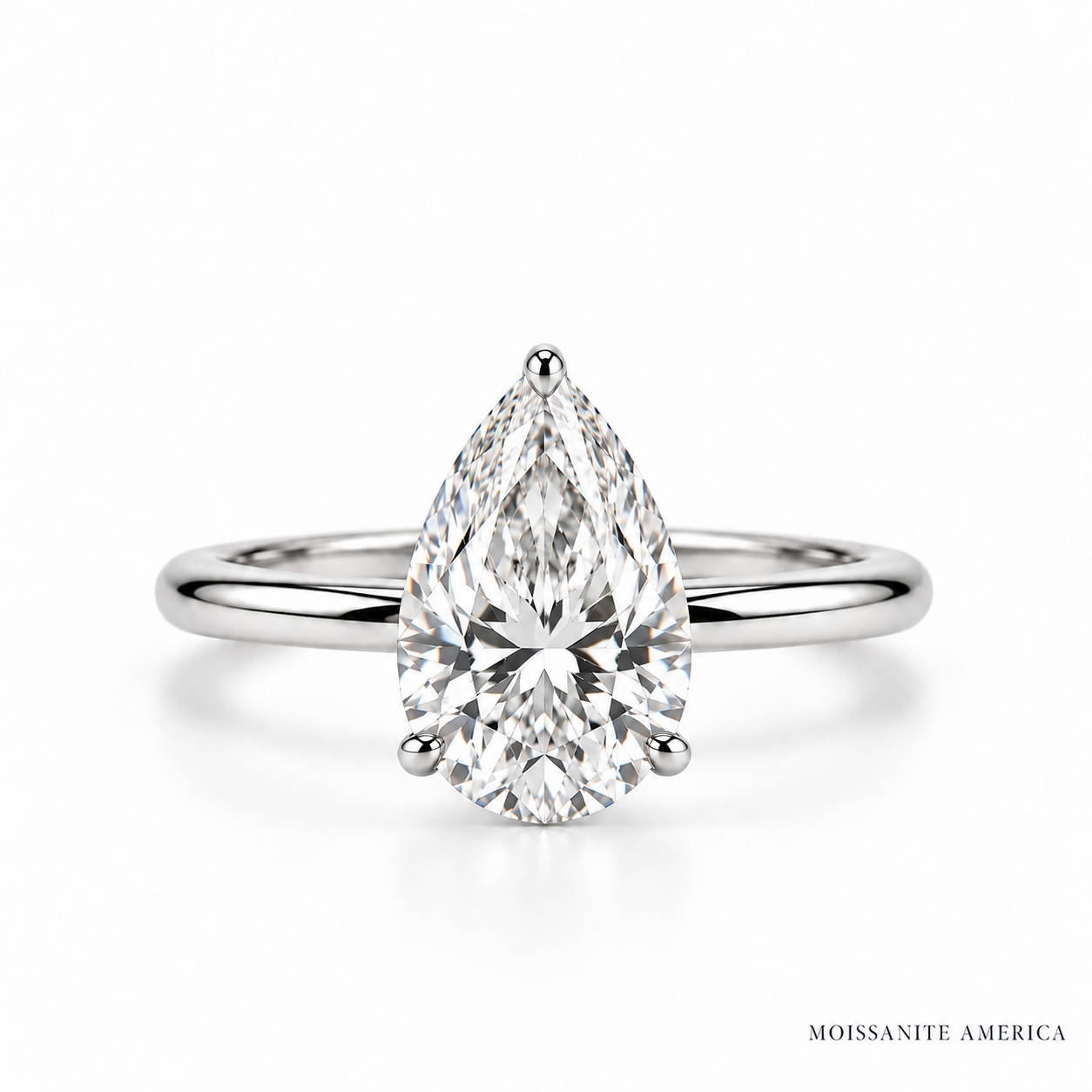 Pear diamond ring on clean white-2.png