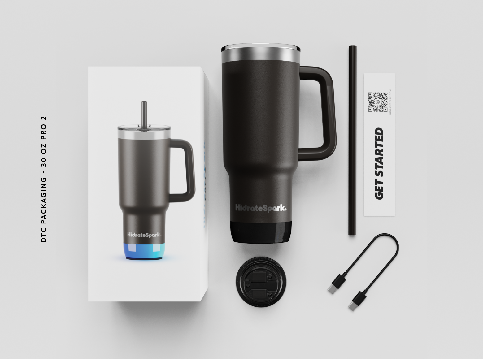 HydrateSpark 30-ounce Pro 2 smart water bottle packaging with bottle, lid, straw, charging cable, and instruction card