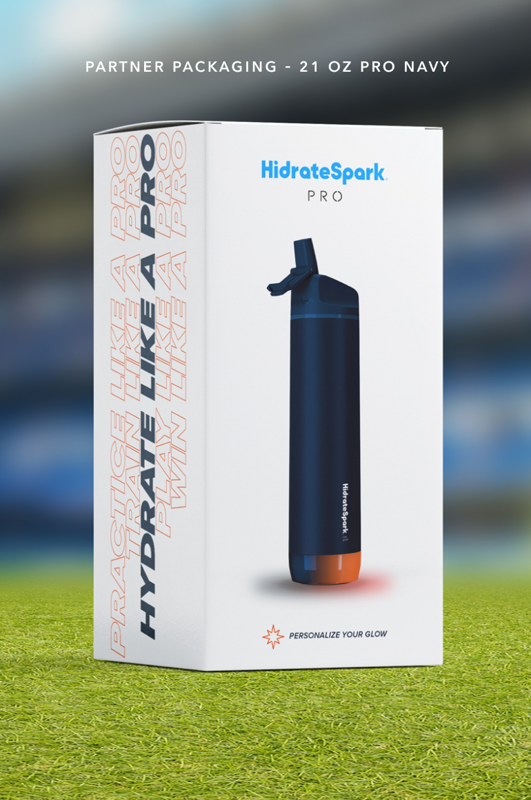 HidrateSpark PRO 21-ounce navy smart water bottle packaging on grass