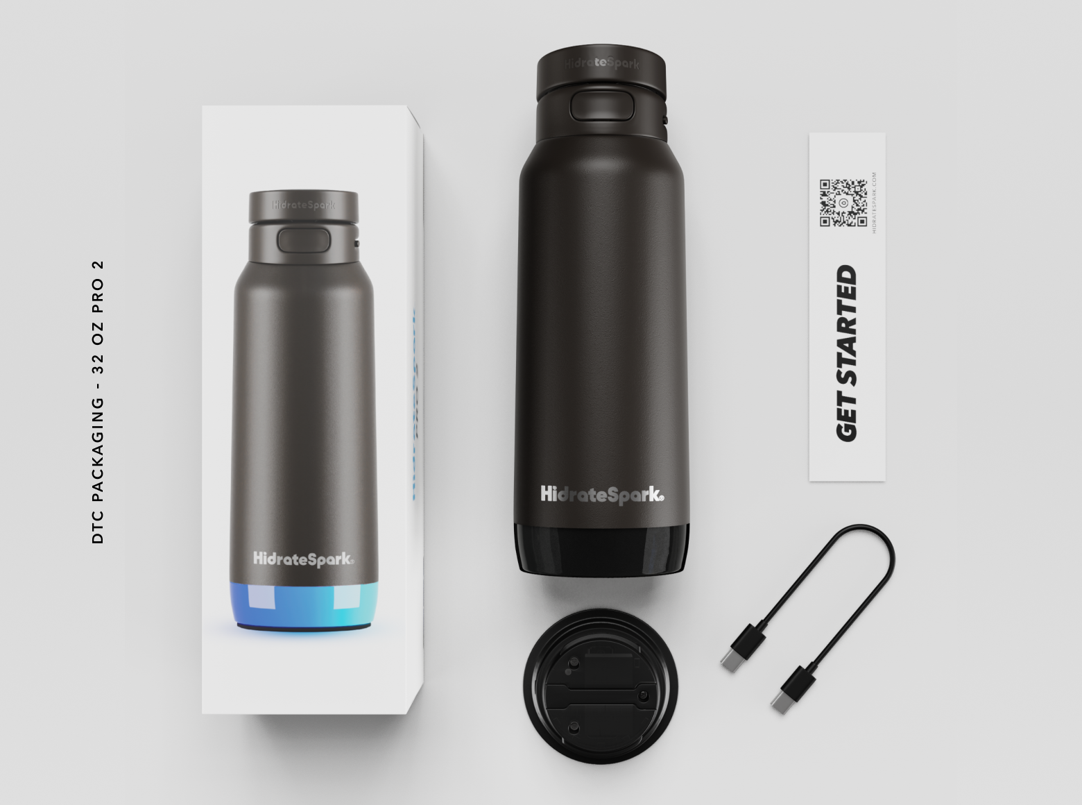 HydrateSpark 32-ounce Pro 2 smart water bottle with packaging, detachable base, charging cable, and quick-start card