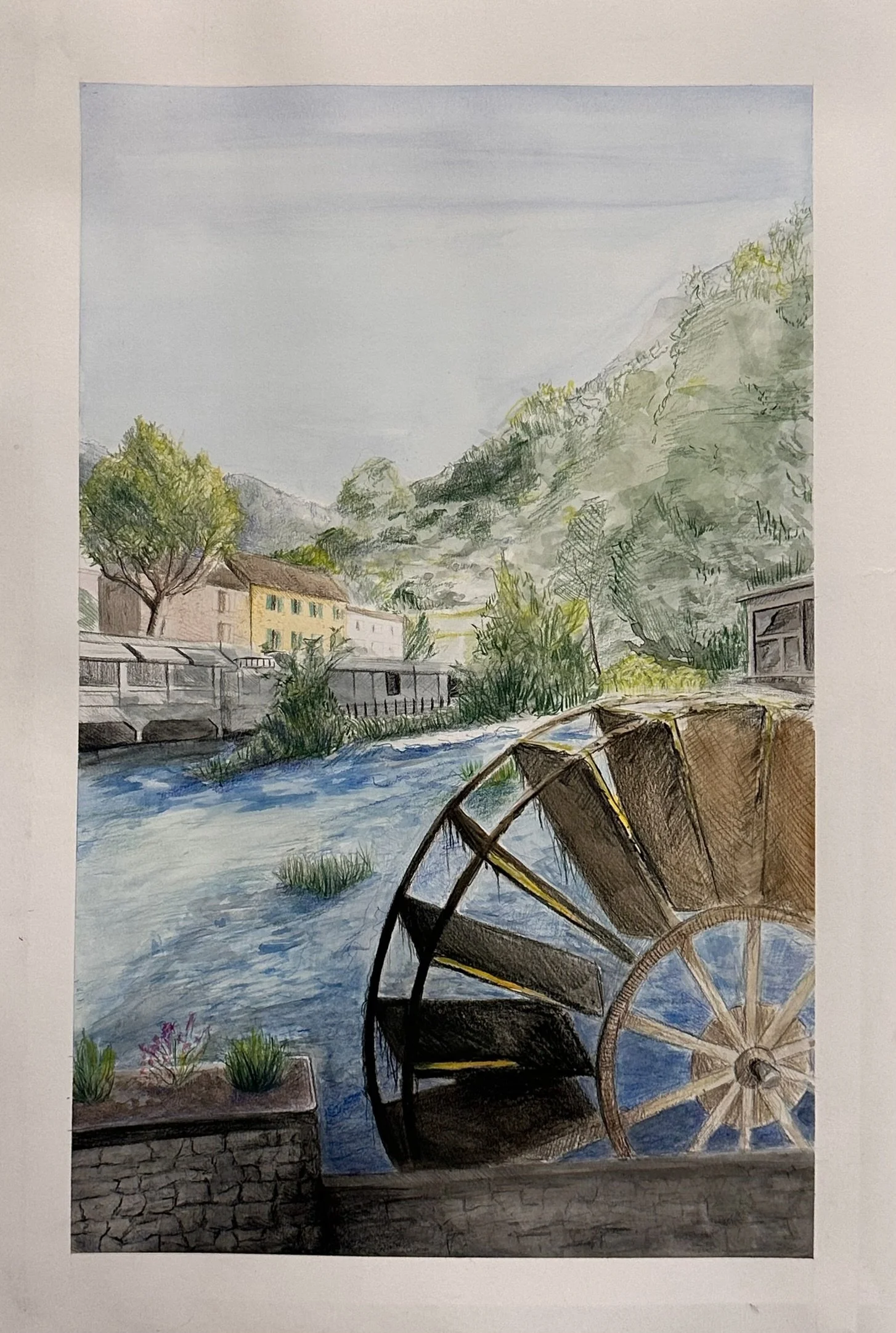 A watercolor painting of a riverside scene with an old wooden cart in the foreground, a flowing river, houses, and green hills with trees, under a cloudy sky.