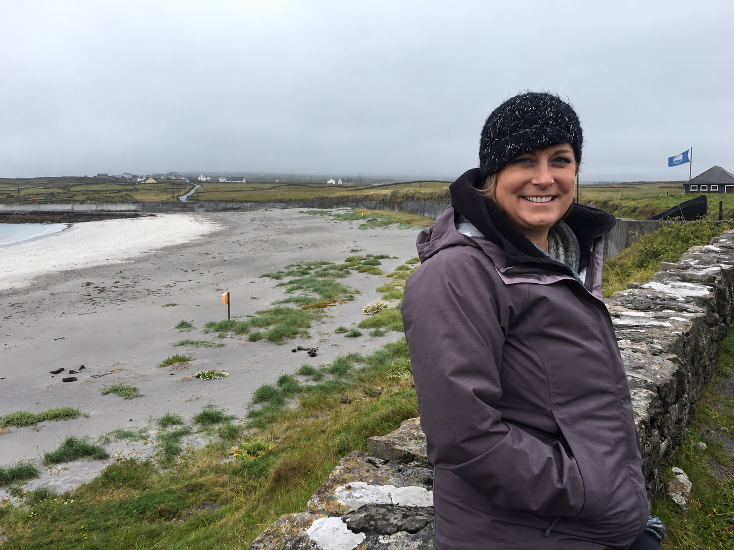 Woman outdoors by the coast