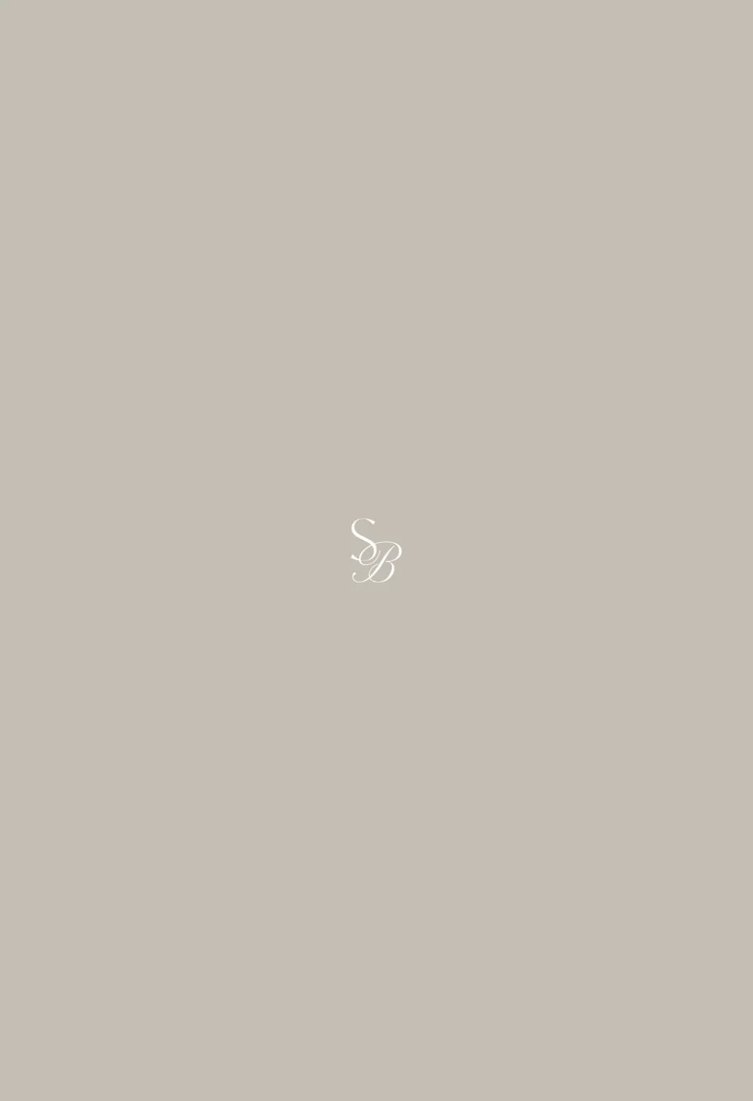A beige background with elegant white initials 'S' and 'B' in the center.