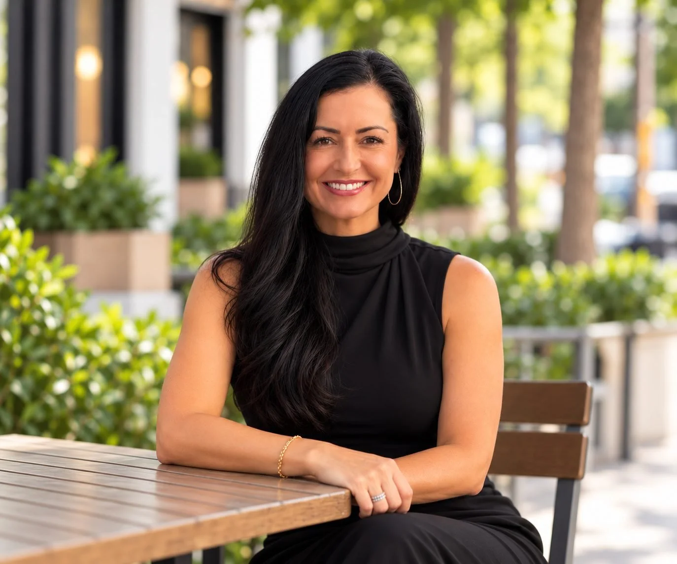 Ashley Lambert, RDN, virtual dietitian, smiling at an outdoor café