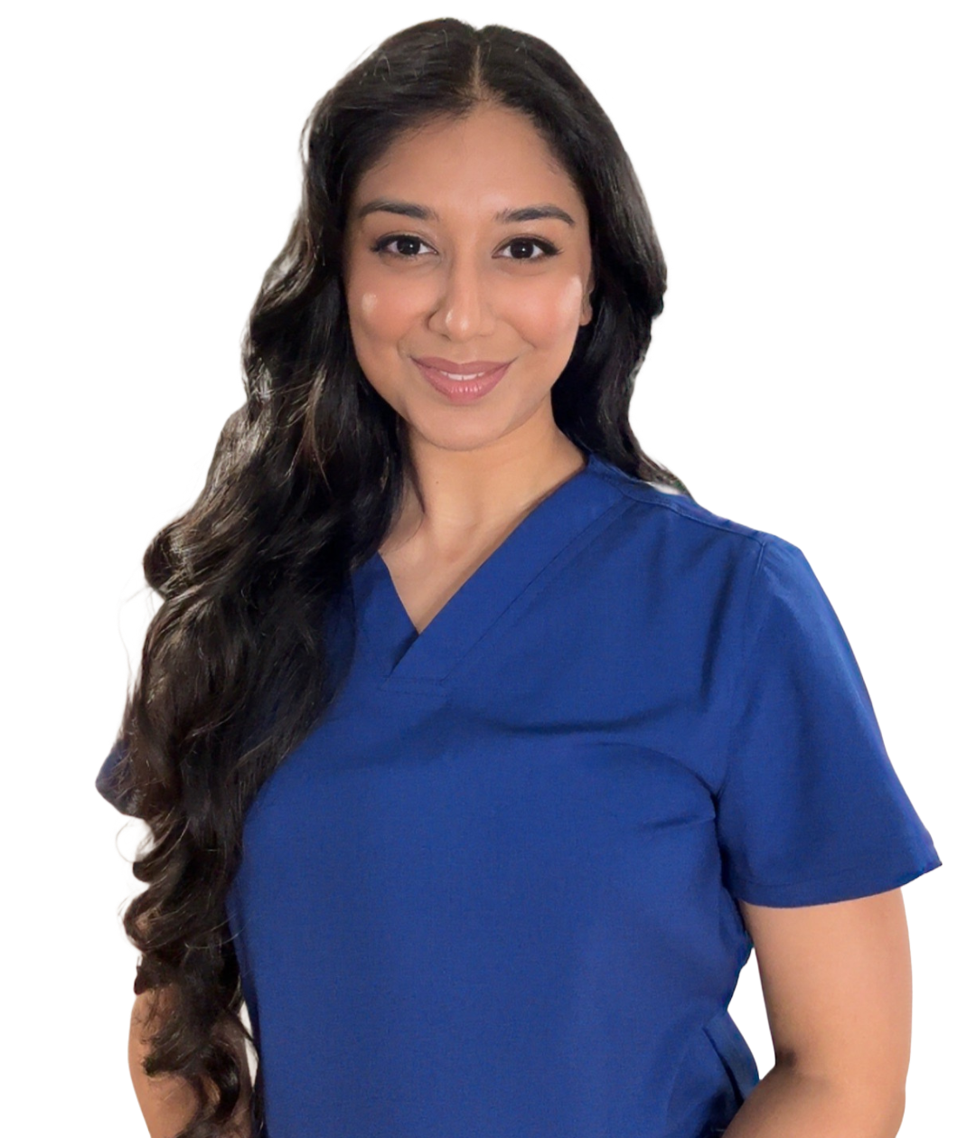 Dr. Gurinder, a woman with long, wavy dark hair wearing blue medical scrubs, is smiling.