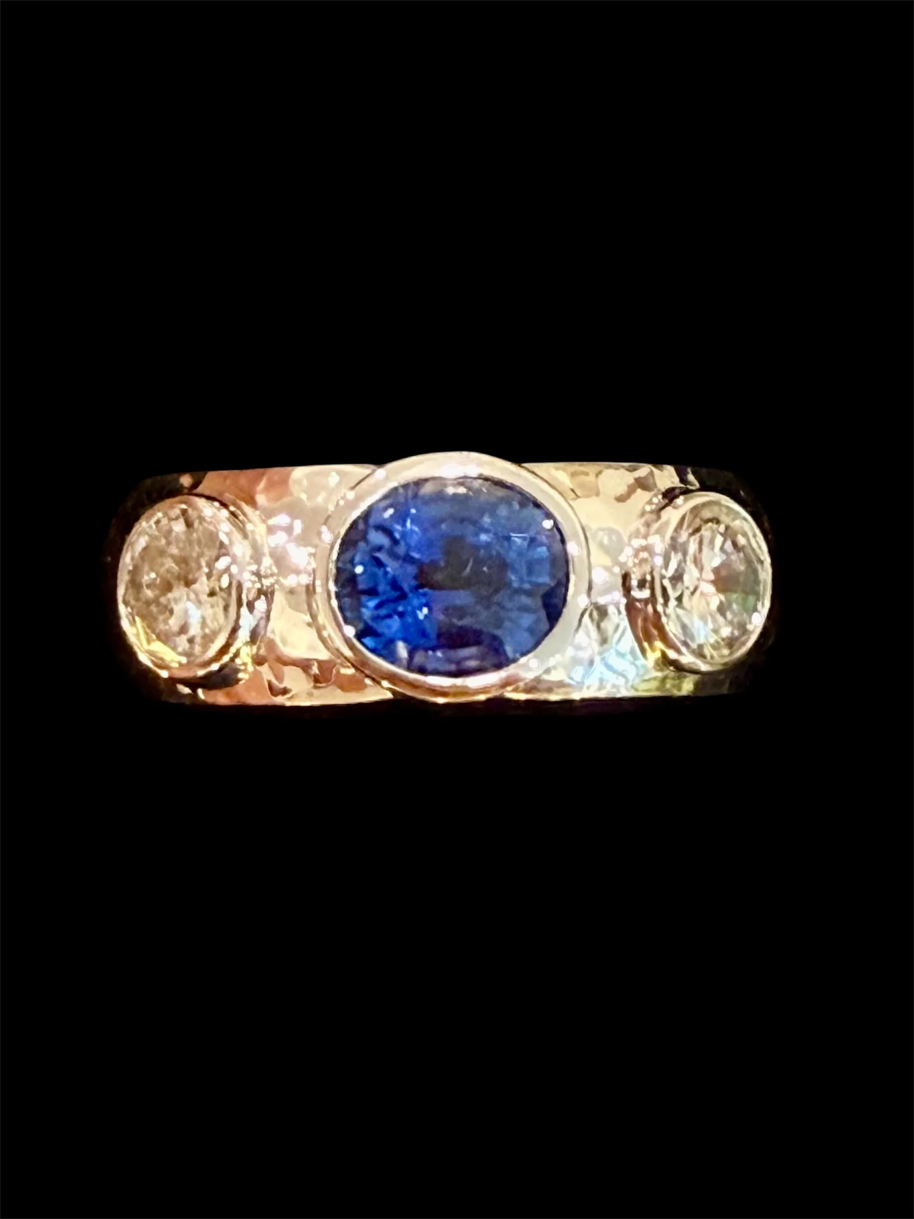 Custom redesigned 14K engagement ring using client's stones.