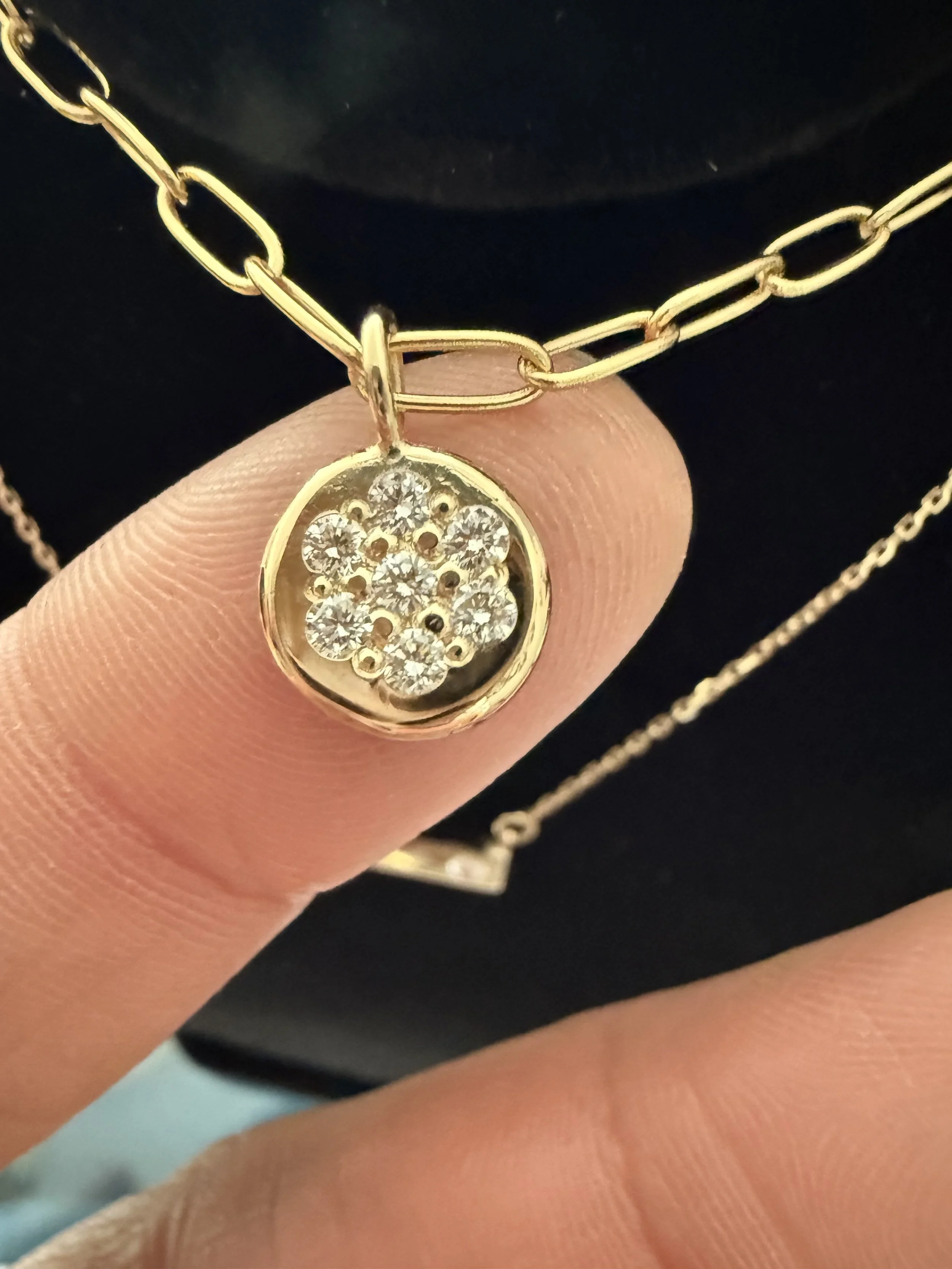 Pavé set ingot pendant using rectcled 14K gold and melee diamonds.