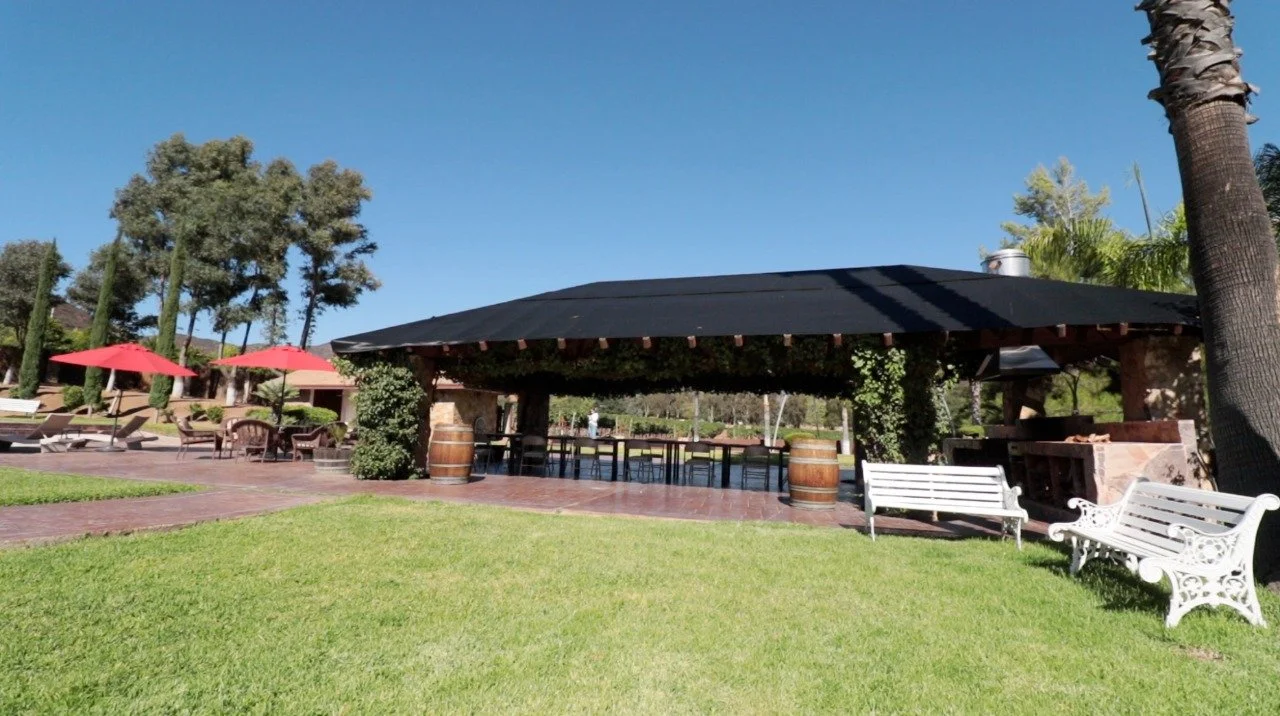 Covered barbecue and outdoor dining area at Baja Vineyard Lodge in Valle de Guadalupe.