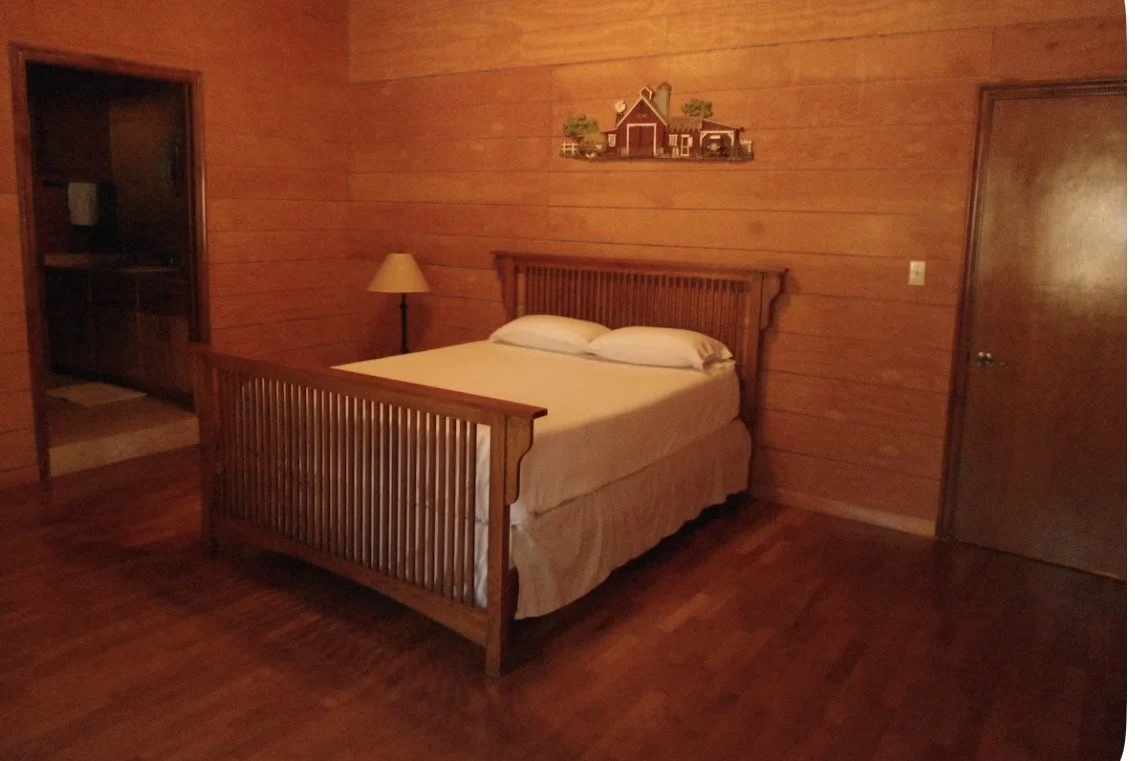 Queen Bedroom • Queen Bed + Twin Bunk Beds • Private Bathroom