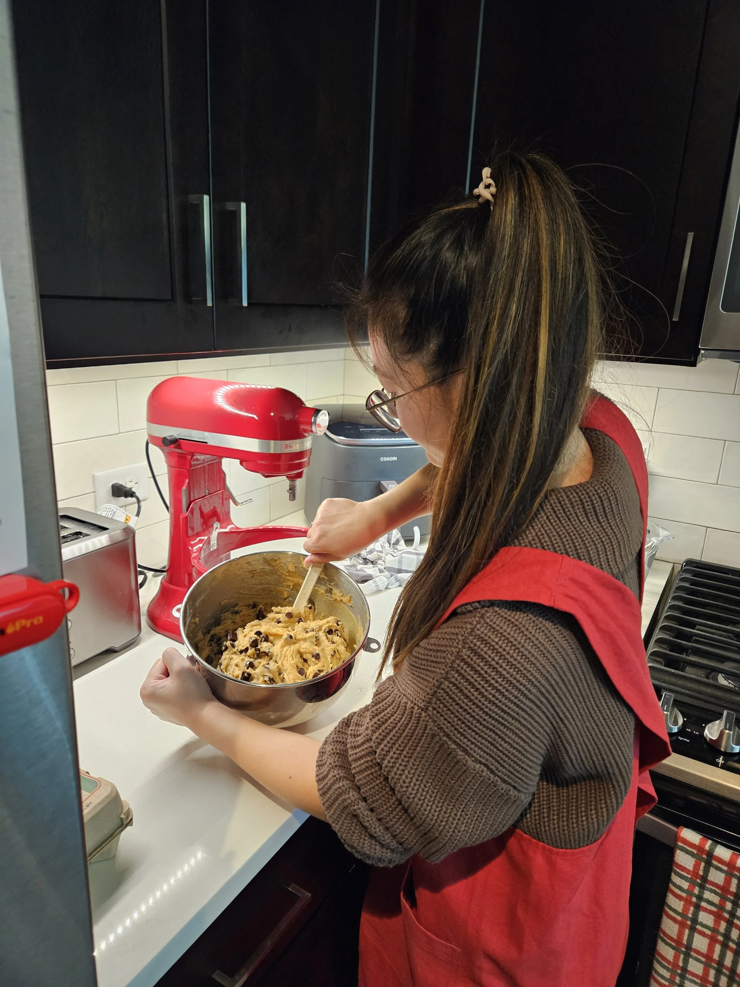 Jocelyn preparing chocolate chip cookies.