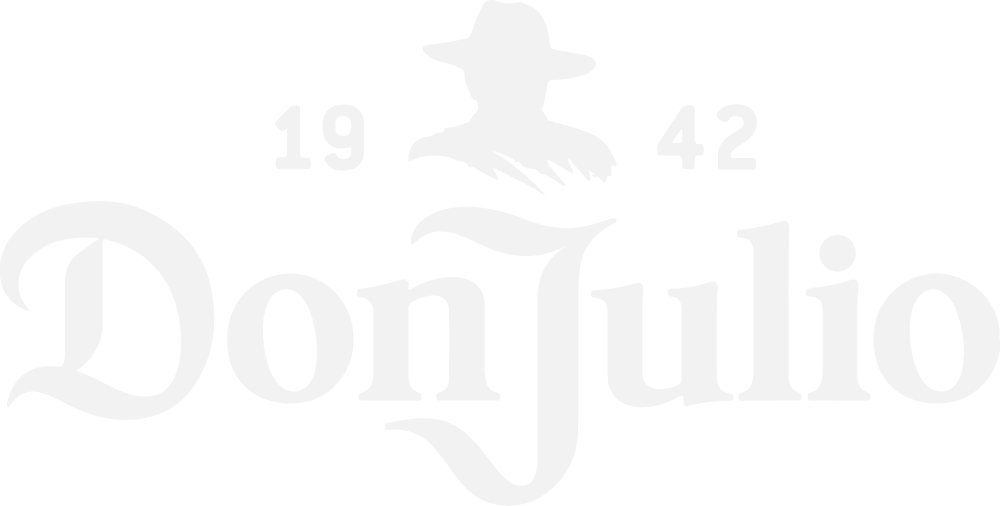 A logo with a cowboy hat, a face silhouette, and text that reads "Don Julio" with the year "1942".