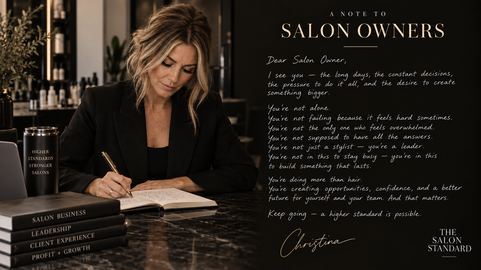 A woman with blonde hair writing at a desk in a salon, with a note to salon owners on the wall discussing leadership and building a lasting business.