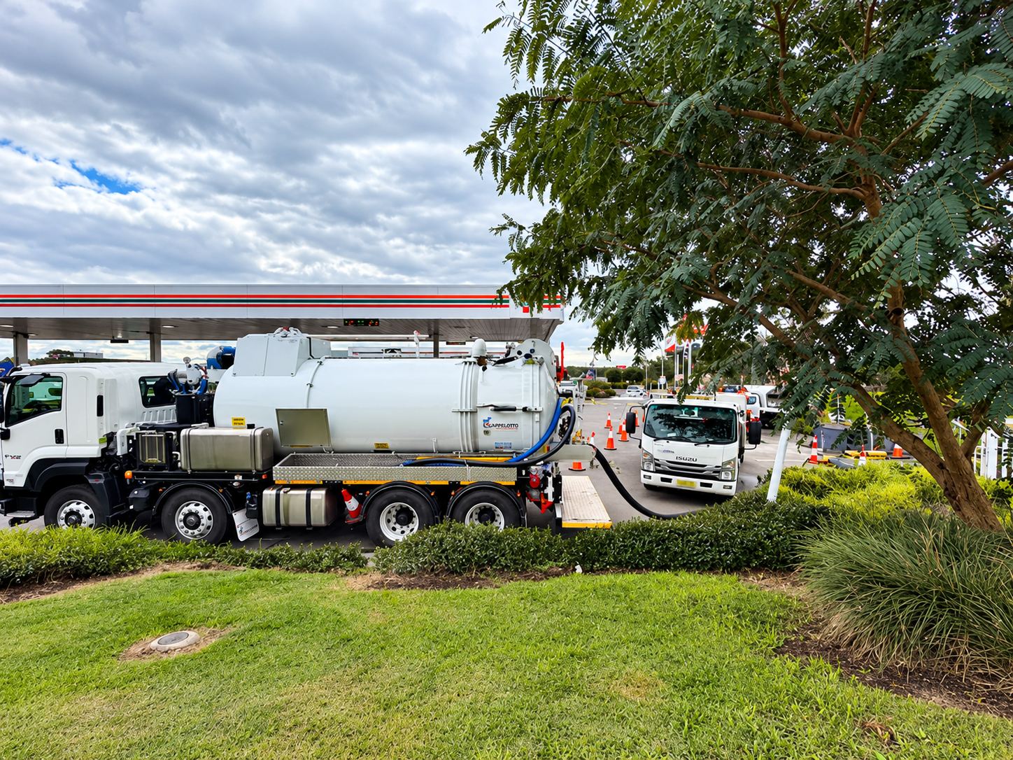 Vacuum tanker responding to a liquid waste spill.