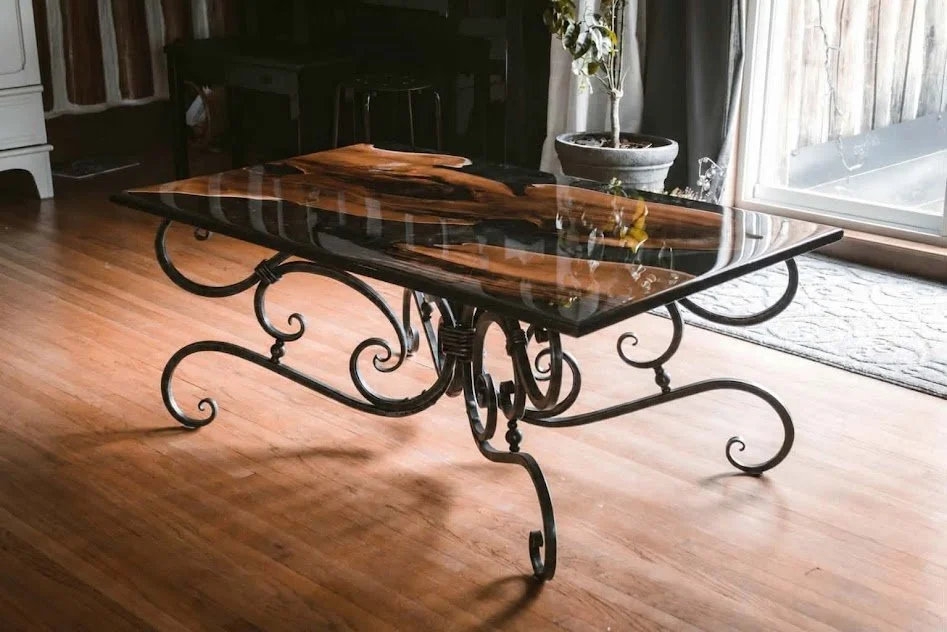 Russian olive epoxy table with hand-forged scrollwork