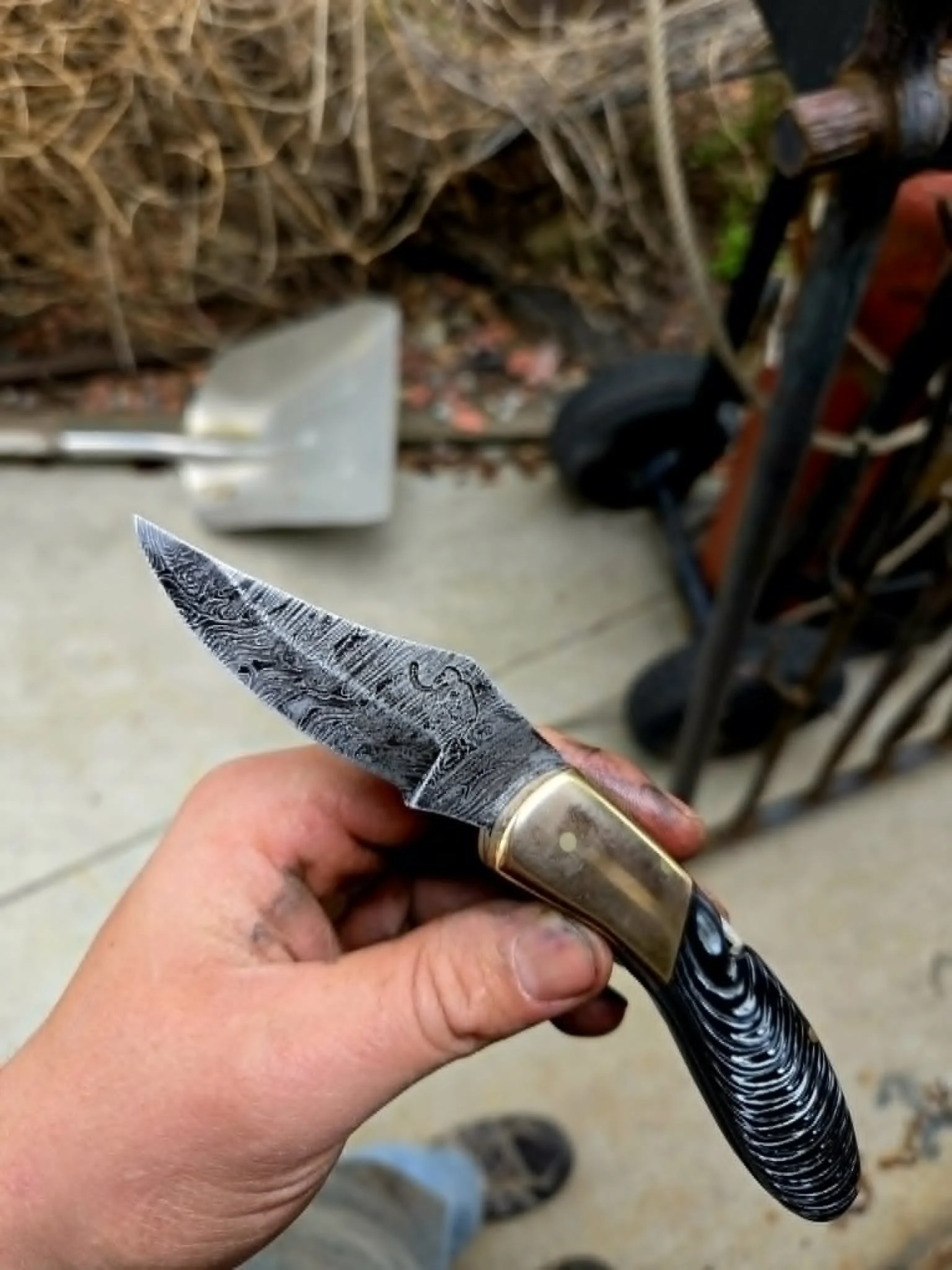 Custom-made Damascus steel folding knife