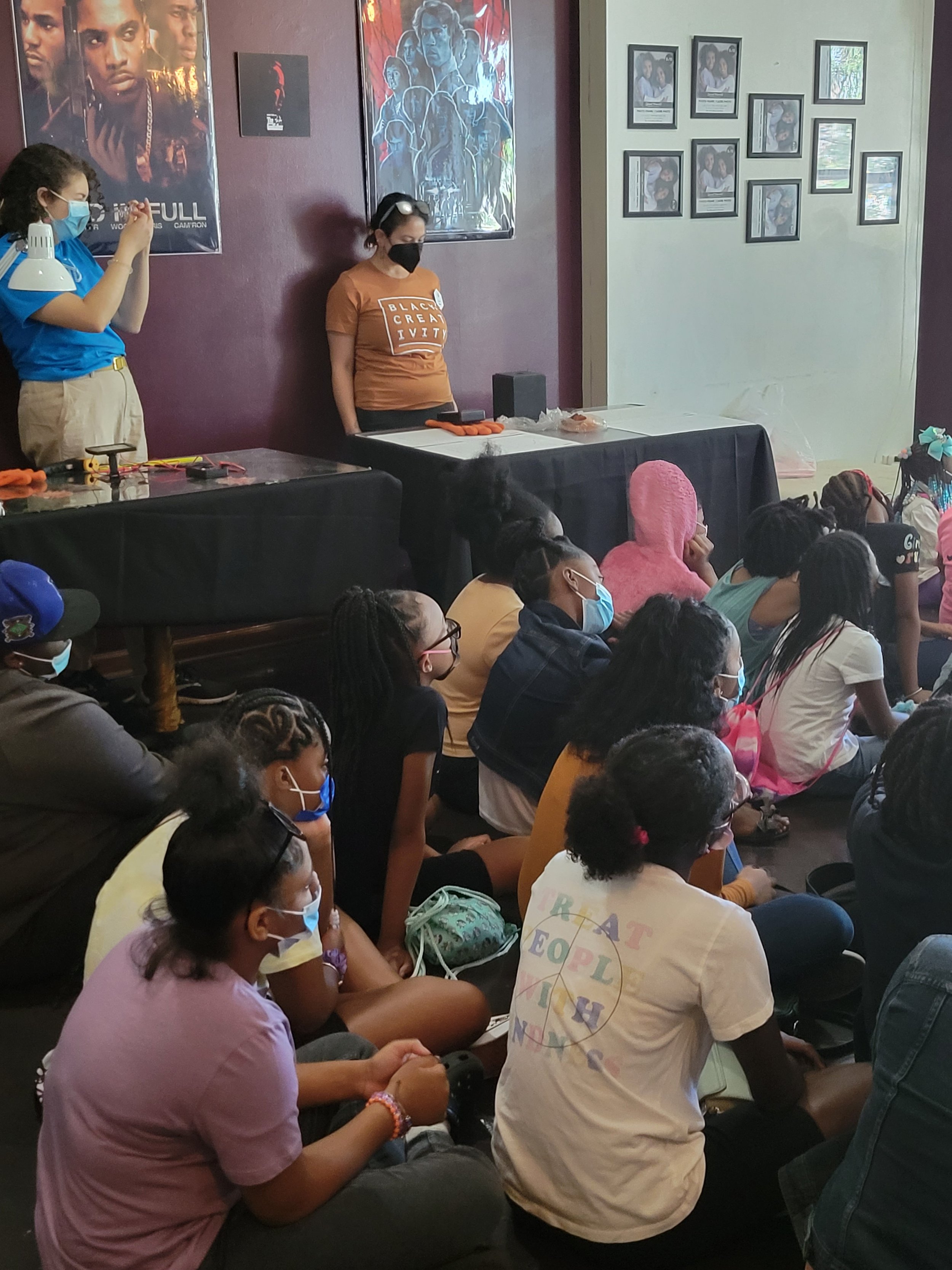 Young people gathered at FAM Entertainment Theater Company in Chicago for a creative arts and community experience.