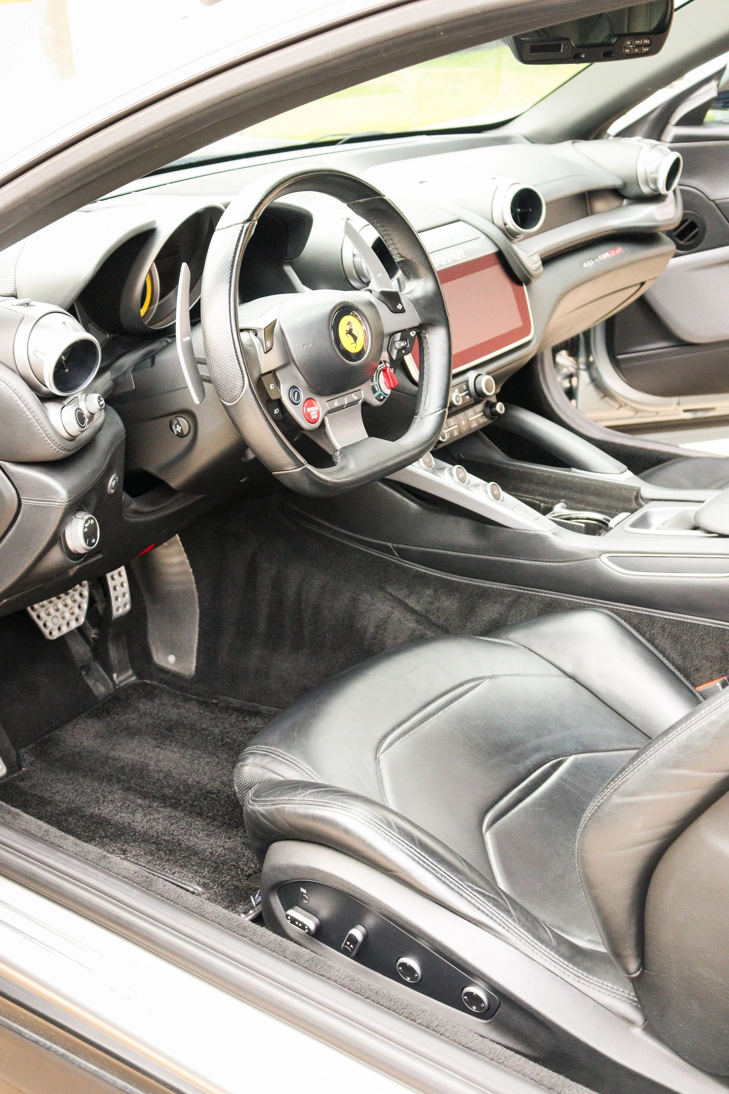 Interior of a Ferrari GTC4 Lusso after it was meticulously cleaned on the interior