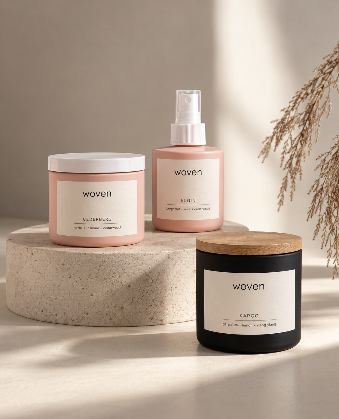 Warm Minimalist Candle and Fragrance Vignette.png