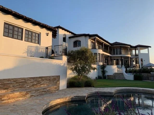 Exterior home stucco repair and paint