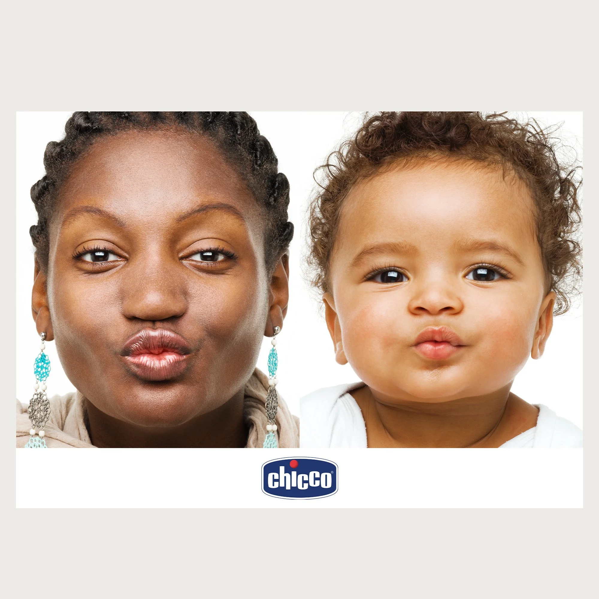 Mother and baby making the same kissing face, side by side on white. Chicco campaign.