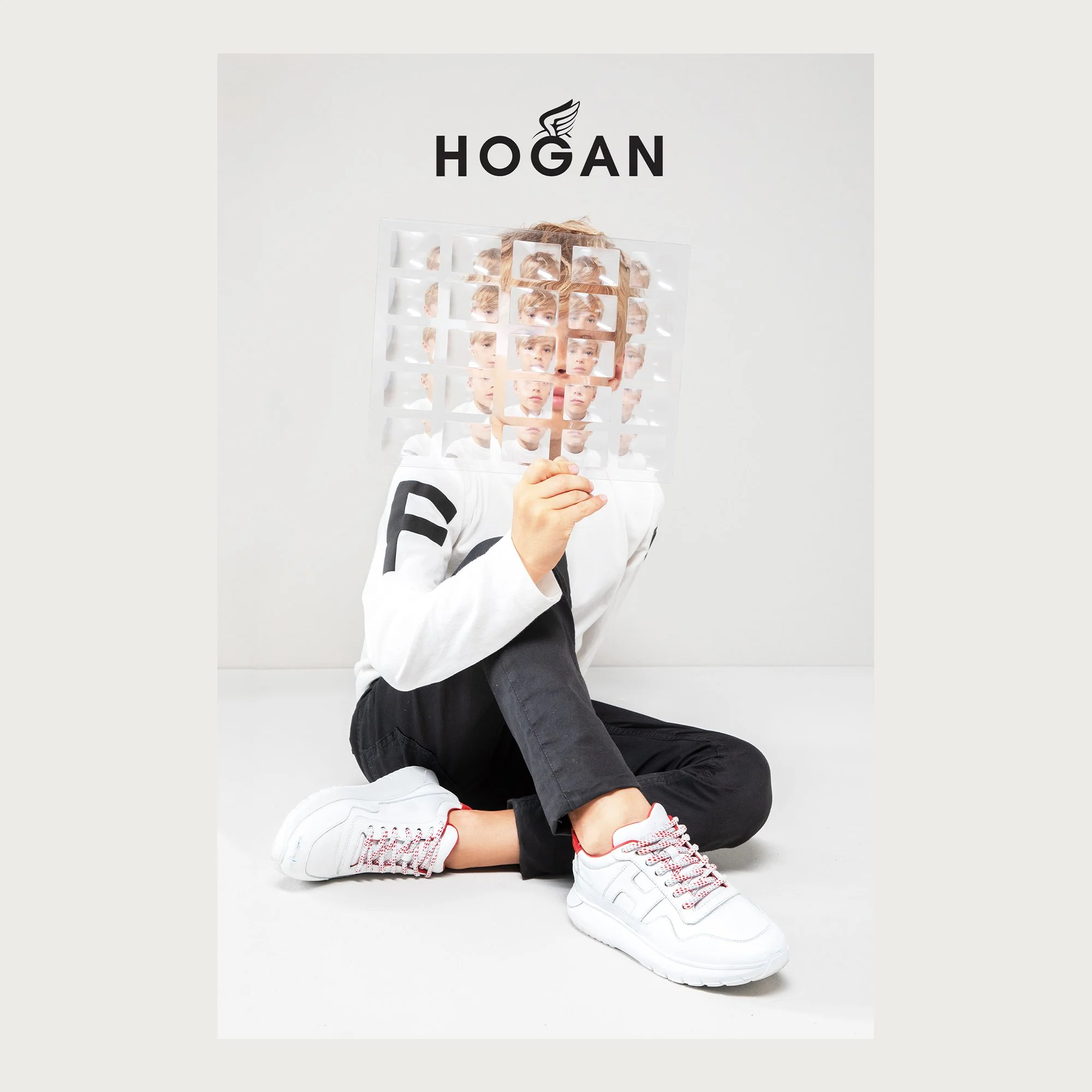 White sneakers, boy’s face multiplied behind a lens grid on white — Hogan campaign.