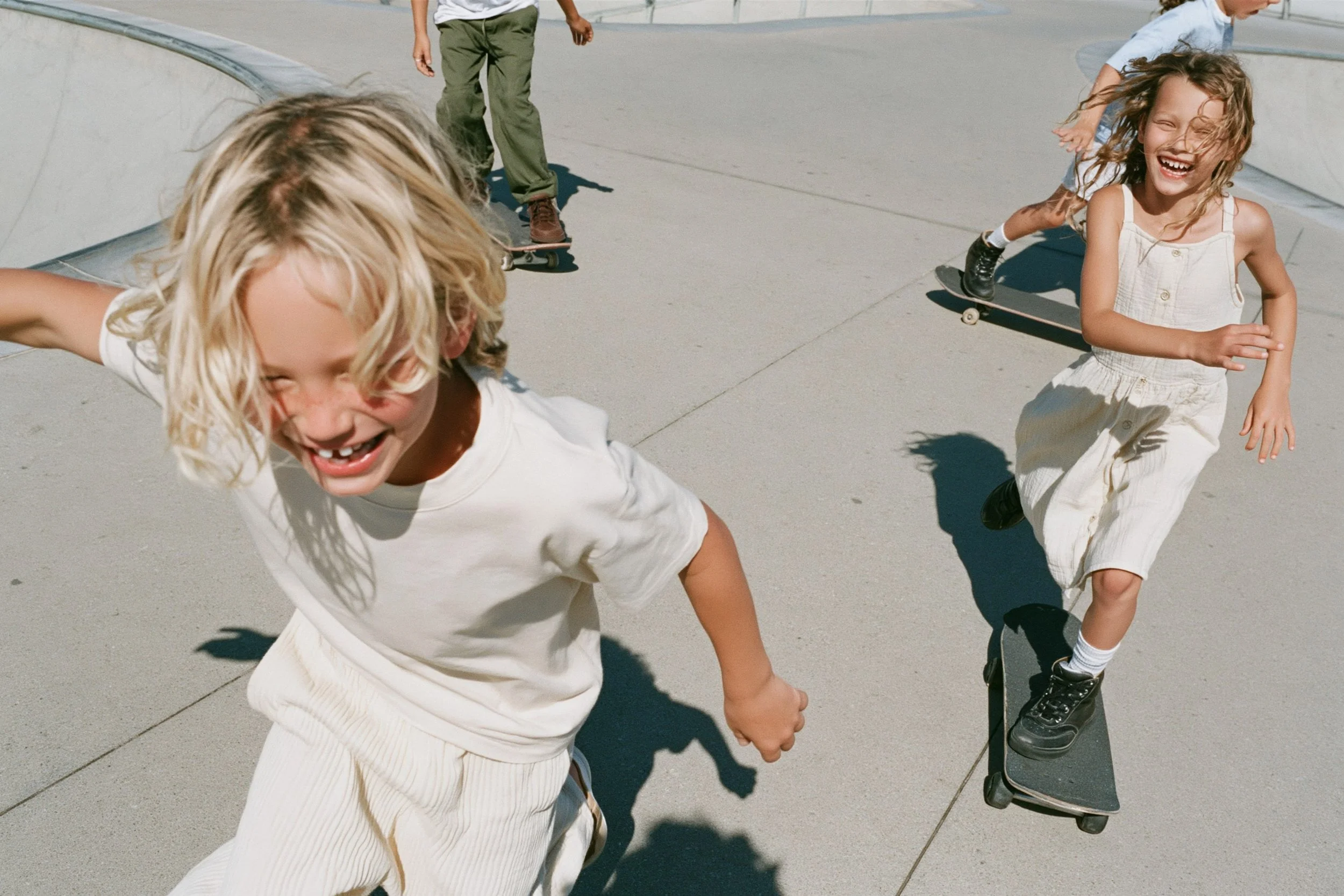 Children running and skating in white. AI generated image.