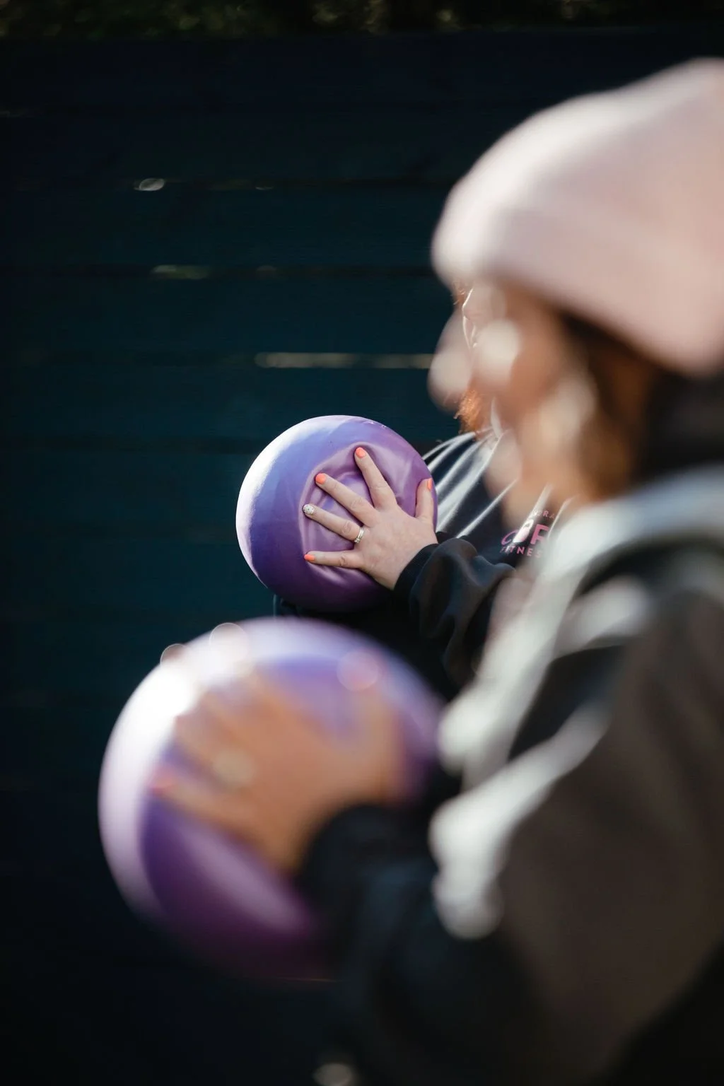 Women exercising outdoors at Holmes Core Fitness