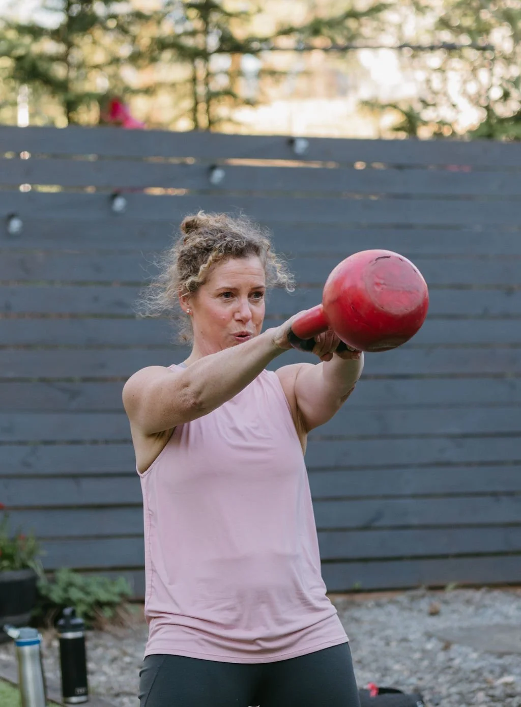 Personal Trainer Sandra performing a kettlebell exercise